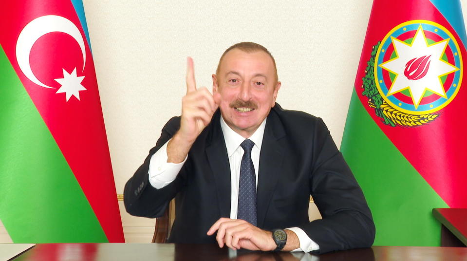 Azerbaijan's President Ilham Aliyev gestures during his address to the nation in Baku, Azerbaijan, in a picture released November 10, 2020 by his official website. / Credit: Handout/Reuters