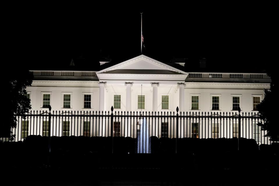 The American flag flies at half staff on the White House after President Joe Biden spoke about the mass shooting at Robb Elementary School in Uvalde, Texas, from the White House, in Washington, Tuesday, May 24, 2022.