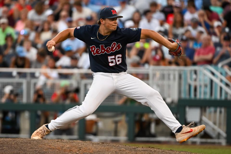 Ole Miss pitcher Jack Washburn (56) throws against Arkansas in the 2022 College World Series. It was Washburn's last appearance in a game until Sunday, when he came back from a year lost to injury and started for Texas Tech in an 11-7 victory over Oregon.