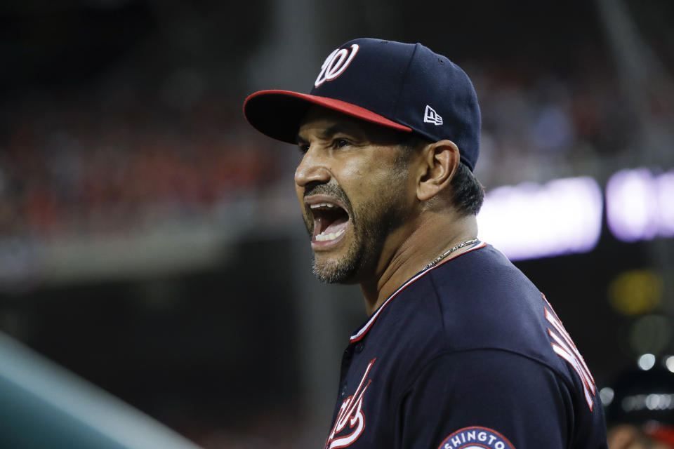 Washington Nationals manager Dave Martinez yells at the home plate umpire during the seventh inning of Game 5 of the baseball World Series against the Houston Astros Sunday, Oct. 27, 2019, in Washington. (AP Photo/Jeff Roberson)
