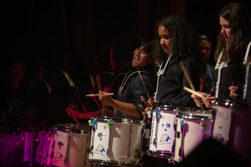 PASADENA, CALIF. - DECEMBER 18: Students perform during the winter show at Wilson Middle School in Pasadena, Calif. on Wednesday, Dec. 18, 2019. Recently the Pasadena Unified School board voted to close three elementary schools and Wilson due to declining enrollment and financial strain. The most popular club on campus: drum line will be disband next year. (Francine Orr / Los Angeles Times)