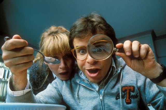 <p>Disney/Kobal/Shutterstock</p> Marcia Strassman and Rick Moranis in <em>Honey, I Shrunk the Kids</em> (1989)