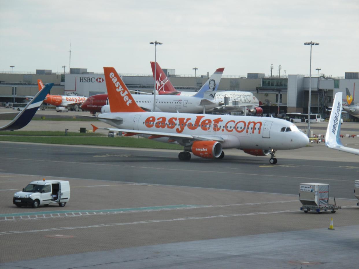 Mixed message: easyJet, Norwegian and Virgin Atlantic aircraft at Gatwick airport: Simon Calder