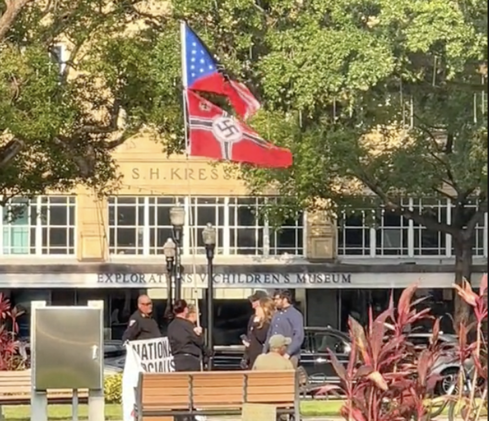 A group waving Nazi flags gathered outside the Explorations V Children’s Museum in Lakeland, Florida (TikTok / amberc0825)