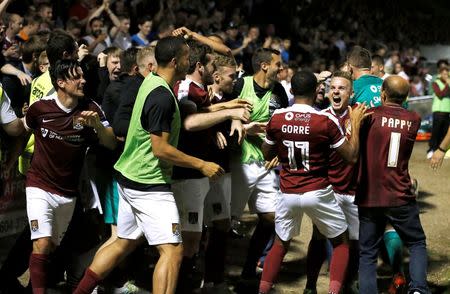 Football Soccer Britain - Northampton Town v West Bromwich Albion - EFL Cup Second Round - Sixfields Stadium - 23/8/16 Northampton Town players celebrate their win at the end of the game Action Images via Reuters / John Clifton