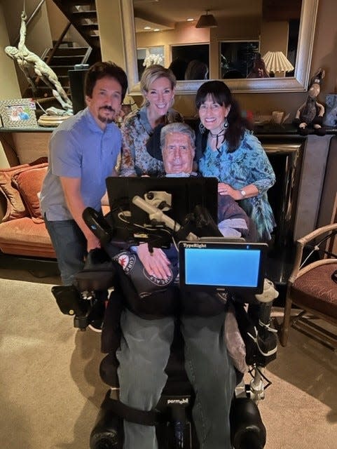 Mitch Albom, left, and his wife, Janine, right, pose with Augie Nieto, center, and his wife, Lynne.