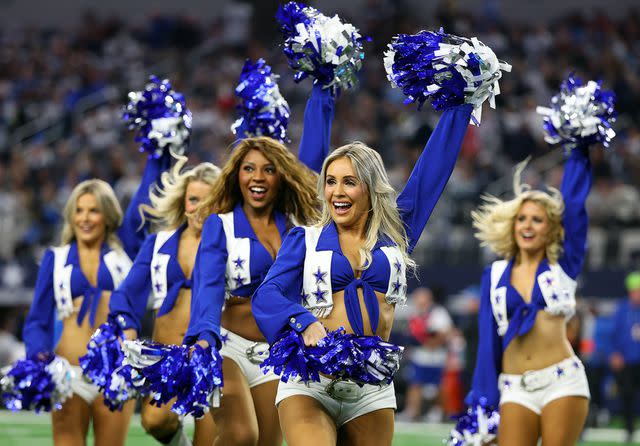 <p>Richard Rodriguez/Getty </p> The Dallas Cowboys Cheerleaders perform during the game against the Detroit Lions at AT&T Stadium on December 30, 2023.