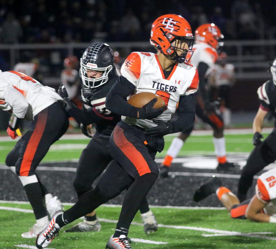 Union-Endicott's Nick Lang picks up yardage during a 37-20 over Elmira in football Sept. 23, 2022 at the new Thomas J. Hurley Athletic  Complex at Elmira High School.