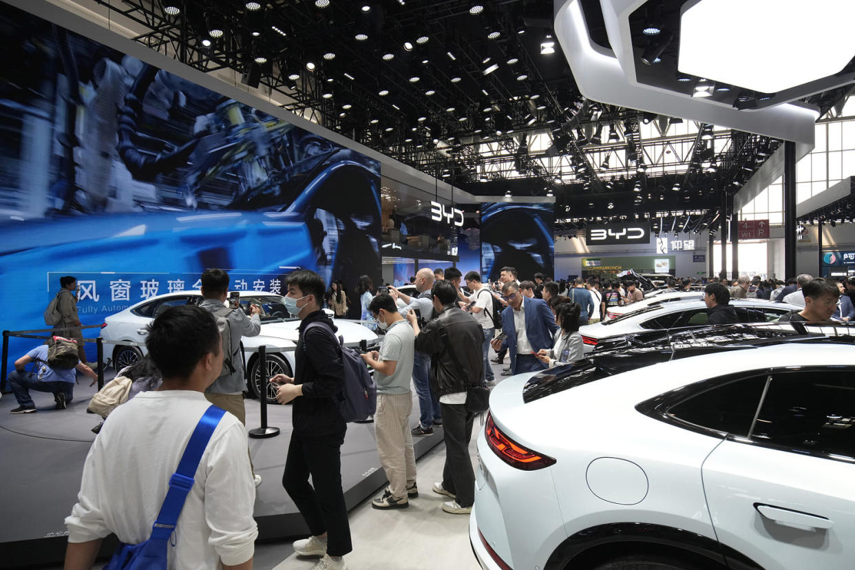 Slowing demand for electric vehicles, heightened trade tensions and questions about whether Western legacy automakers can interest Chinese consumers will be the talk of Beijing as executives from top global car marques descend on the capital for the Auto China show. (Qilai Shen / Bloomberg via Getty Images)