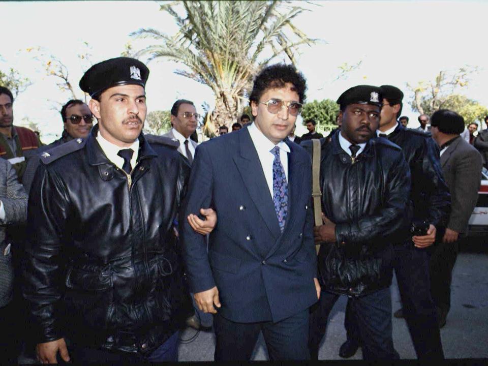 Lybian Abdel Basset al-Megrahi escorted by authorities