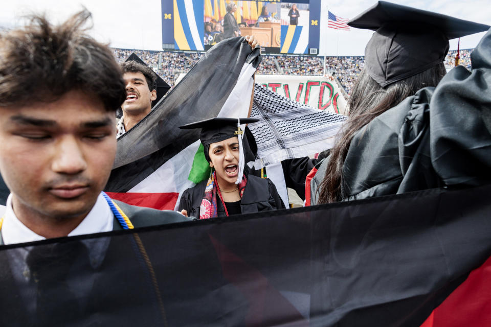 Pro-Palestinian protesters demonstrate during the University of Michigan's Spring 2024 Commencement Ceremony at Michigan Stadium in Ann Arbor, Mich., on Saturday, May 4, 2024. (Jacob Hamilton/Ann Arbor News via AP)