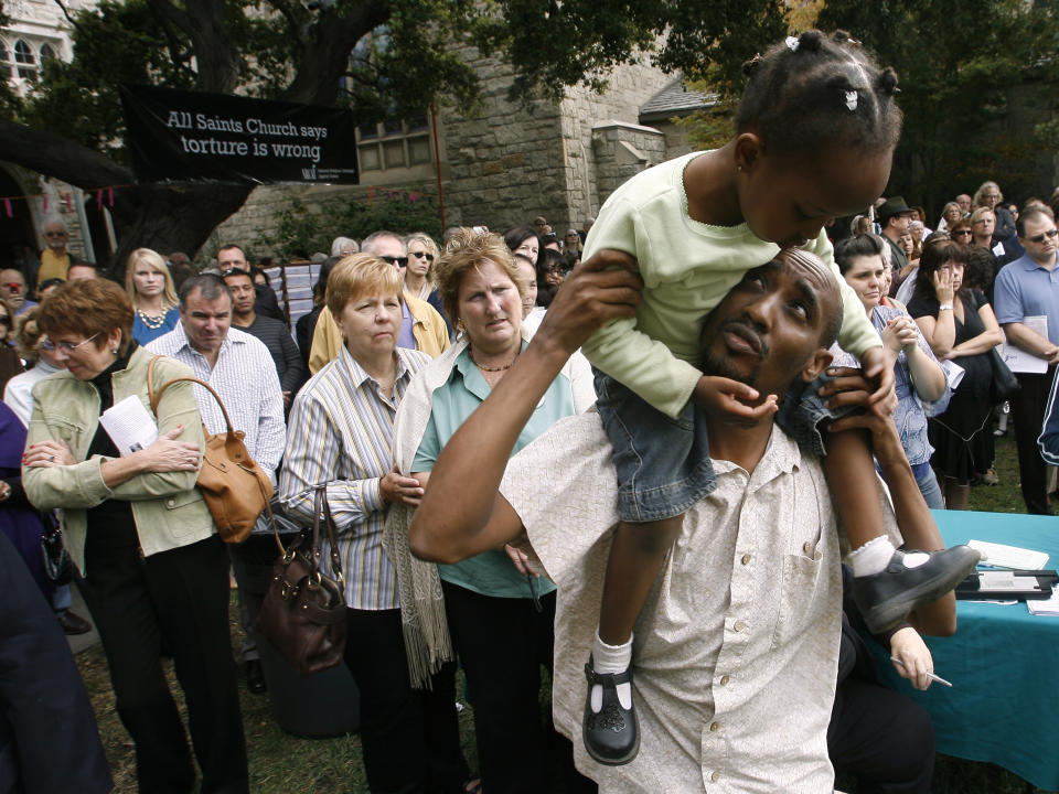 FILE - John Kisimir and his daughter Timpi, 3, along with other parishioners listen to Rev. Edwin Bacon, of All Saints Episcopal Church, during a news conference in support of same-sex marriages and in fighting Proposition 8, Sunday, Nov. 9, 2008, in Pasadena, Calif. California lawmakers are going to try to introduce legislation Tuesday, Feb. 14, 2023, to officially repeal a 15-year-old voter initiative meant to ban same-sex marriage in the state. (AP Photo/Gus Ruelas, File)