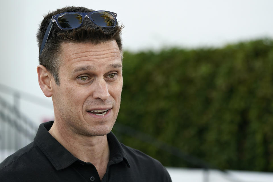 FILE -Seattle Mariners general manager Jerry Dipoto talks with reporters during Major League Baseball's GM Meetings Tuesday, Nov. 9, 2021, in Carlsbad, Calif. Jerry Dipoto saw up close last year during the regular season and again in October where the differences lie if the Seattle Mariners expect to close the gap on Houston in the AL West.(AP Photo/Gregory Bull, File)