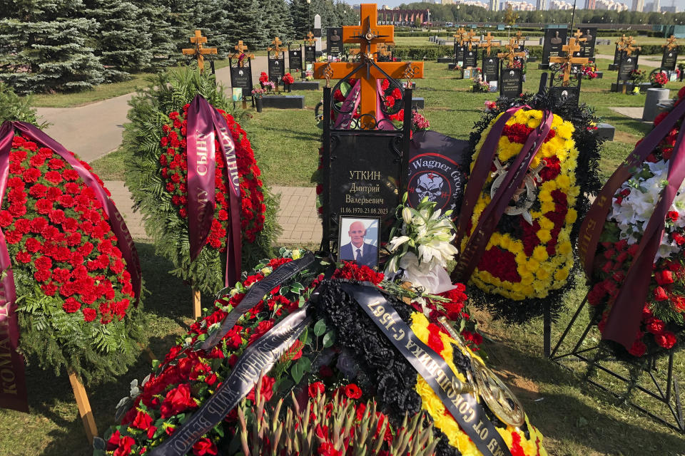 A view of the grave of Dmitry Utkin, who oversaw Wagner Group's military operations, at the Federal Military Memorial Cemetery in Mytishchy, outside Moscow, Russia, Thursday, Aug. 31, 2023. Utkin, whose military call sign Wagner gave the name to the group, is presumed to have died in a plane crash along with Wagner's owner Yevgeny Prigozhin and other military company's officers was buried at the Federal Military Memorial Cemetery in Mytishchy, outside Moscow on Thursday. (AP Photo/Alexander Zemlianichenko)