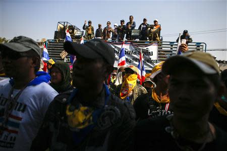 Anti-government protesters gather outside The Cooperative Auditing Department during a rally in central Bangkok January 24, 2014. REUTERS/Athit Perawongmetha