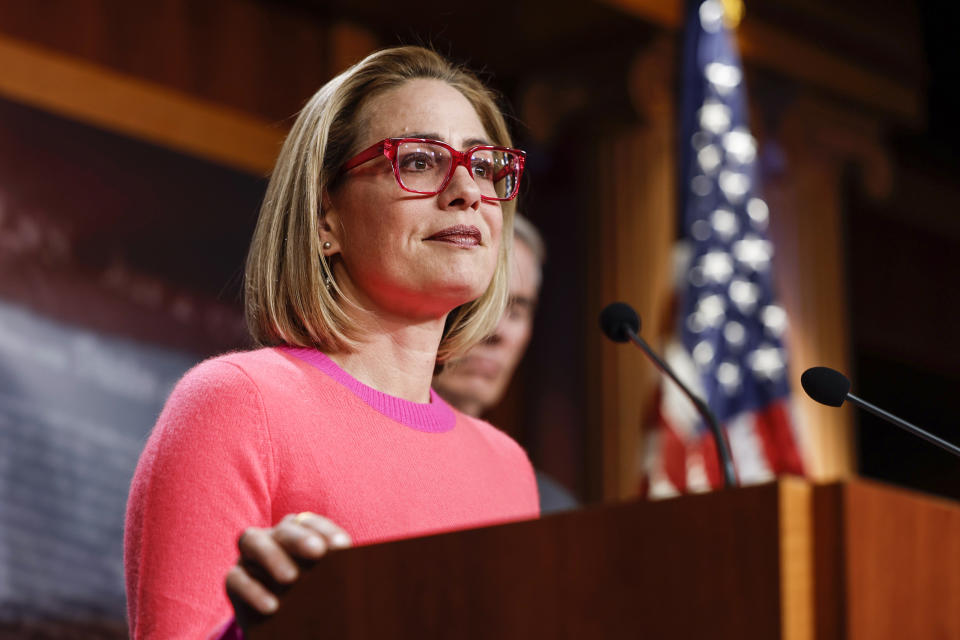 Image: Sen. Kyrsten Sinema, D-Ariz.,  speaks at a news conference at the Capitol on Nov. 29, 2022. (Anna Moneymaker / Getty Images file)