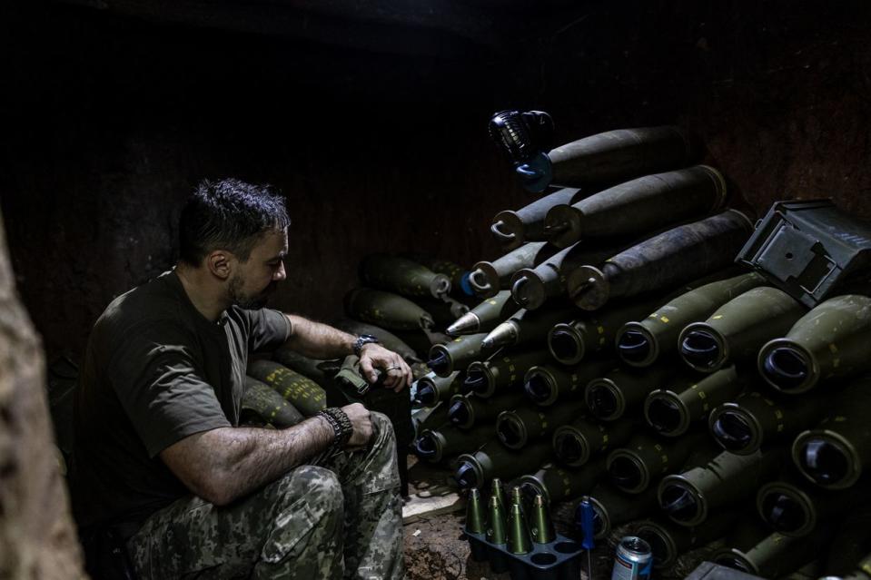 A Ukrainian soldier prepares 155mm artillery shells in his fighting position as Ukrainian Army conduct operation to target trenches of Russian forces through the Donetsk Oblast amid Russia and Ukraine war in Donetsk Oblast, Ukraine on Aug. 6, 2023. (Diego Herrera Carcedo/Anadolu Agency via Getty Images)