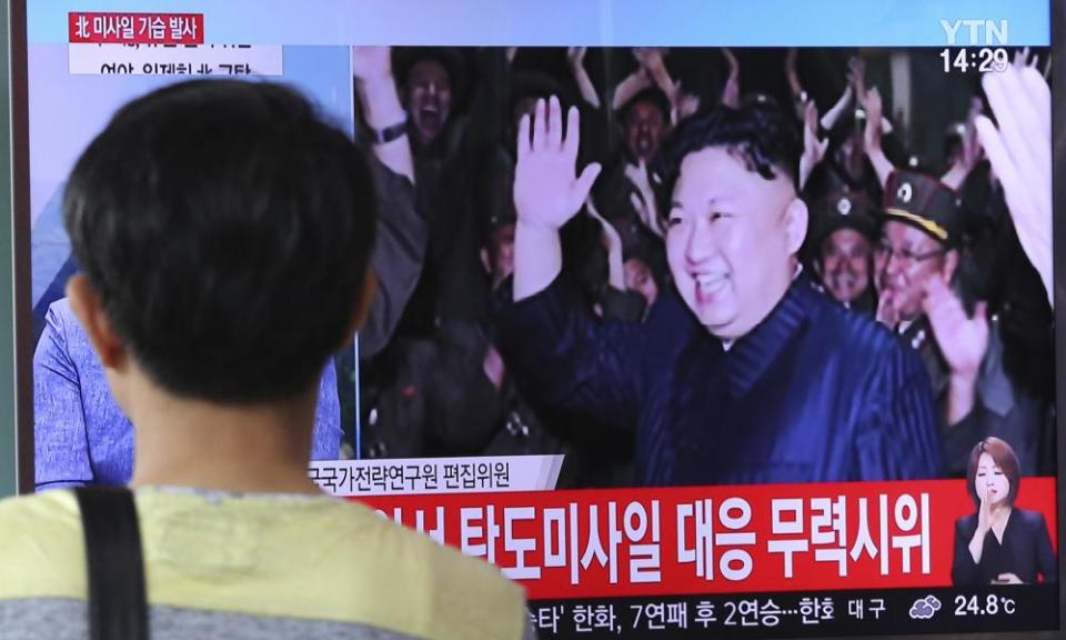 A TV in South Korea shows Kim Jong-un during the North’s latest test launch of an intercontinental ballistic missile. Rex Tillerson has said the US does not seek regime change in Pyongyang.