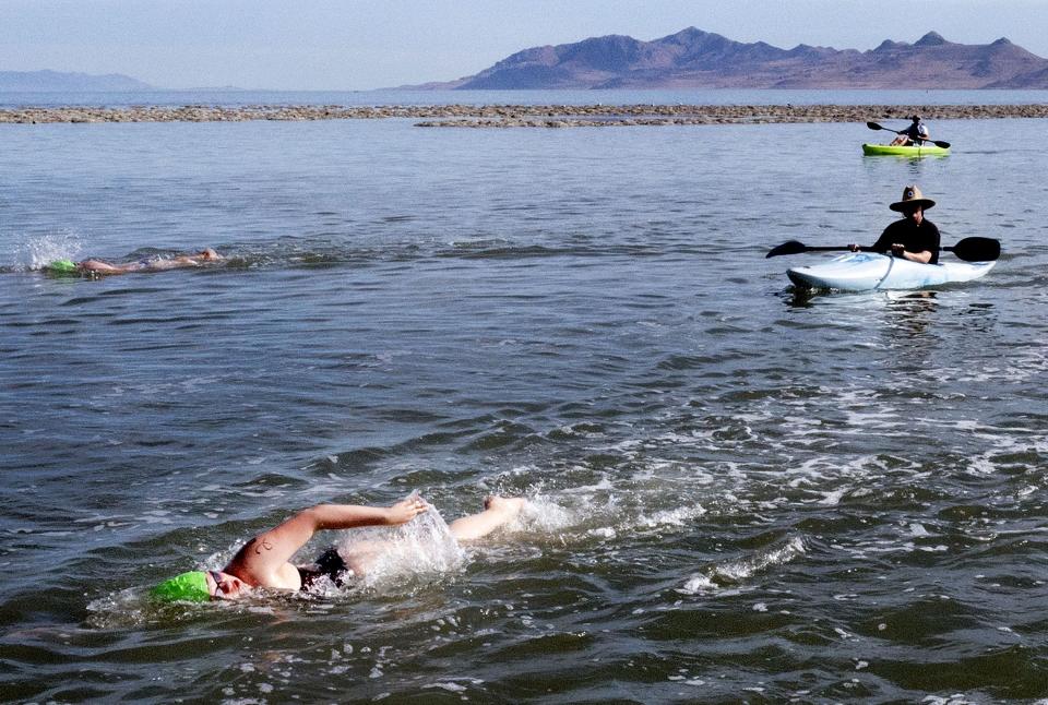 Swimmers and their “spotters” compete in an open swim competition at the Great Salt Lake State Park in Magna on Saturday, June 11, 2022. | Laura Seitz, Deseret News