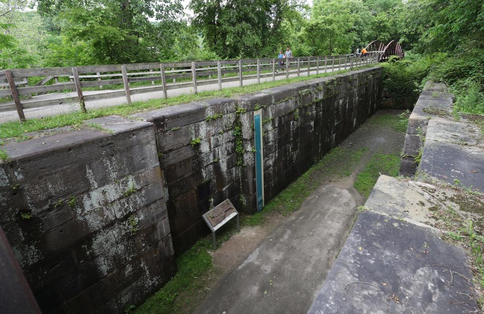 A lock is visible along the Cuyahoga River off the Ohio u0026 Erie Canal Towpath Trail at the Lock 29 Trailhead in Cuyahoga Valley National Park.