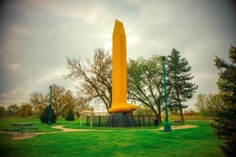 The World's Largest Golden Spike is located in Council Bluffs, Iowa.