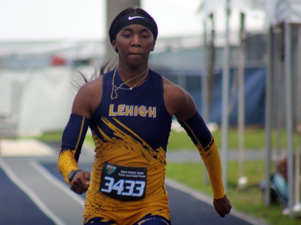 Sanaa Geter of Lehigh (3433) races down the runway to the girls long jump  during the FHSAA Class 4A high school track and field championship in Jacksonville on May 20, 2023. [Clayton Freeman/Florida Times-Union]