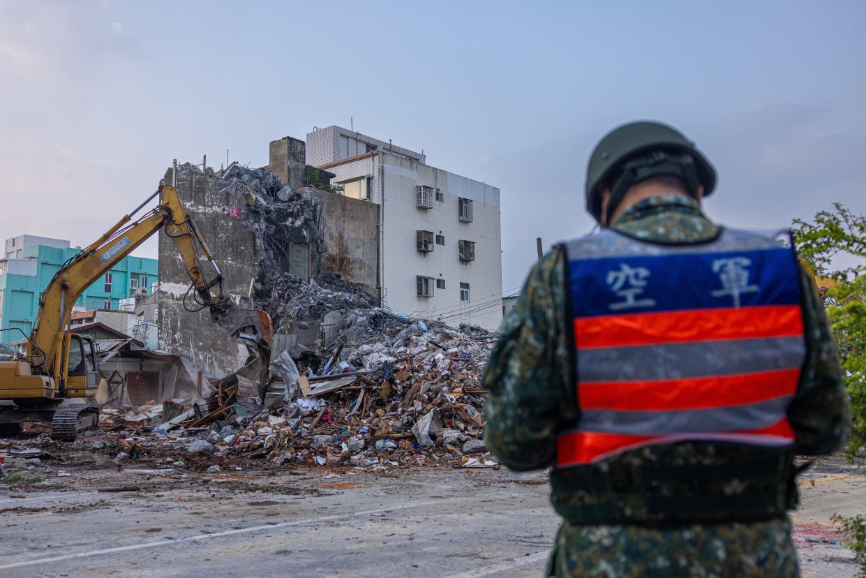 Rescue teams demolish a severely damaged building following an earthquake, April 4, 2024, in Hualien, Taiwan. / Credit: ANNABELLE CHIH/Getty