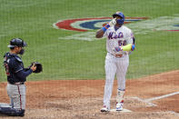 New York Mets' Yoenis Cespedes, right, celebrates his solo home run during the seventh inning of a baseball game against the Atlanta Braves at Citi Field, Friday, July 24, 2020, in New York. (AP Photo/Seth Wenig)