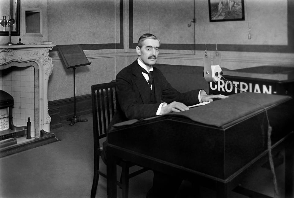 Minister of Health, Neville Chamberlain broadcasting at the BBC