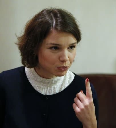 Zhanna Nemtsova, daughter of slain opposition leader Boris Nemtsov, gestures during an interview with Reuters in Berlin, Germany, November 25, 2015. REUTERS/Fabrizio Bensch