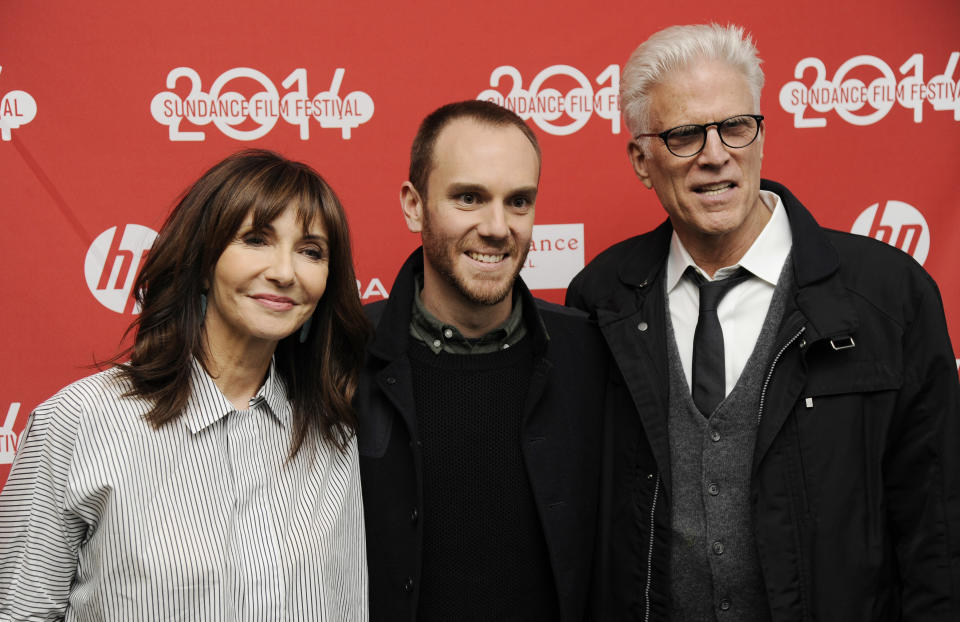 Charlie McDowell, center, director of "The One I Love," poses with cast member Ted Danson and Danson's wife, actress Mary Steenburgen, at the premiere of the film at the 2014 Sundance Film Festival, Tuesday, Jan. 21, 2014, in Park City, Utah. (Photo by Chris Pizzello/Invision/AP)