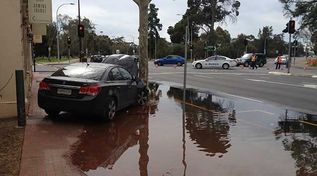 Emergency crews clean up after the O'Connell St crash. Photo: Matt Gerke, 7News.