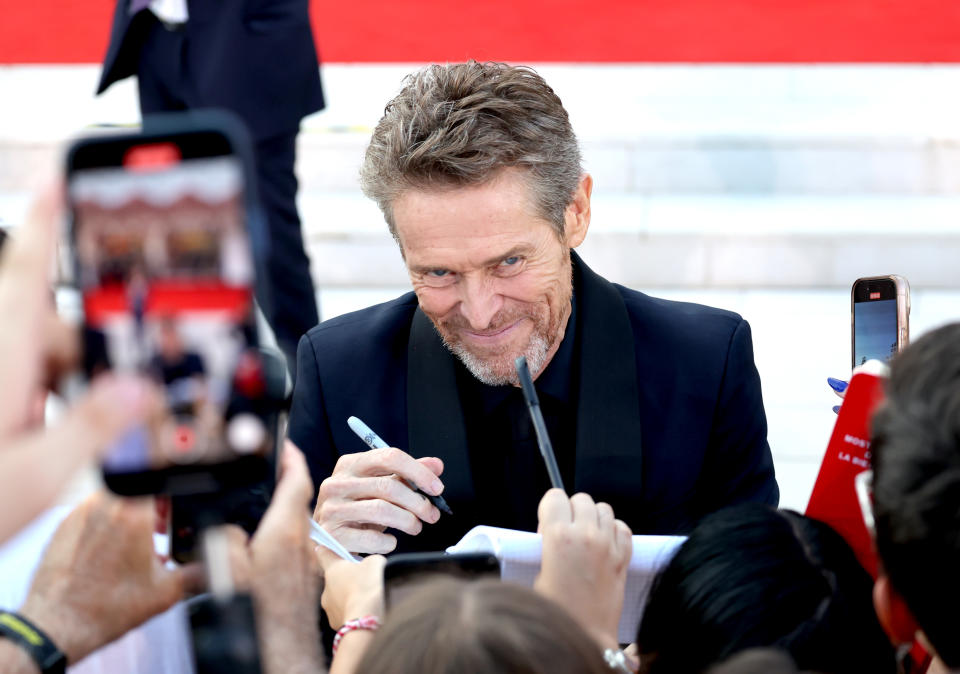 <p>Willem Dafoe signing autographs at the Beetlejuice Beetlejuice premiere in Venice. (Photo by Victor Boyko/Getty Images)</p>
