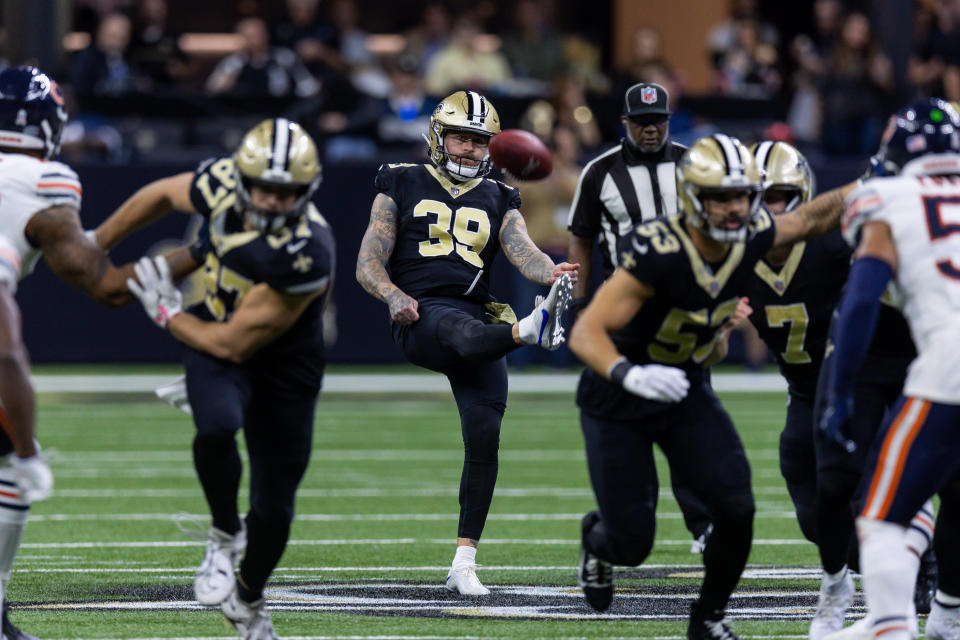 Nov 5, 2023; New Orleans, Louisiana, USA; New Orleans Saints punter Lou Hedley (39) punts the ball to the Chicago Bears during the second half at the Caesars Superdome. Mandatory Credit: Stephen Lew-USA TODAY Sports