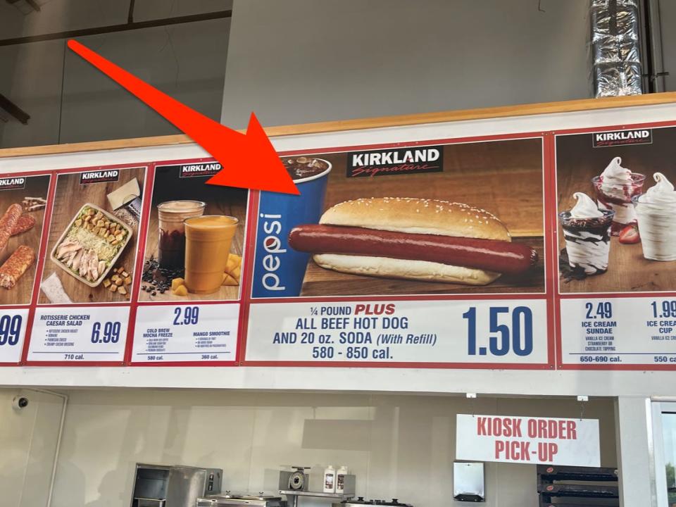 Picture of hot dog on menu at Costco with a red arrow pointing to it