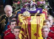 <p>On September 8, 2022, Queen Elizabeth passed away at Balmoral Castle in Scotland at the age of 96. Here, her eldest son looks emotional as he follows behind her coffin during her funeral service. </p>