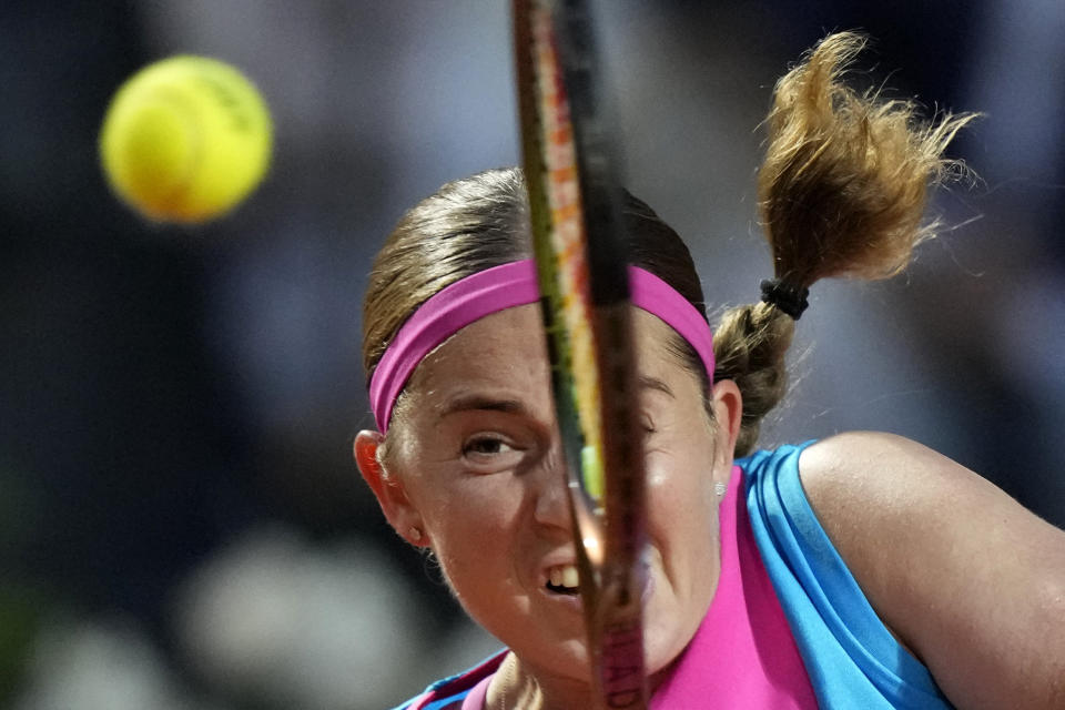 Latvia's Jeļena Ostapenko returns the ball during a semi-final match against Kazakhstan's Elena Rybakina, at the Italian Open tennis tournament in Rome, Italy, Friday, May 19, 2023. (AP Photo/Andrew Medichini)