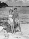<p>The automobile heir and tire heiress enjoy the waves at Cambridge Beaches in Bermuda.</p>