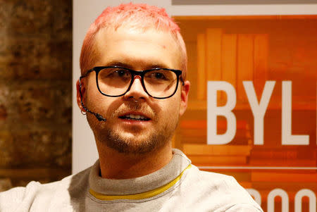 Christopher Wylie, a whistleblower who formerly worked with Cambridge Analytica, the consulting firm that is said to have harvested private information from more than 50 million Facebook users, speaks at the Frontline Club in London, Britain, March 20, 2018. REUTERS/Henry Nicholls