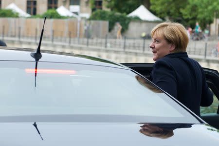 German Chancellor Angela Merkel enters a car after ARD summer-interview in Berlin, Germany August 28, 2016. REUTERS/Stefanie Loos