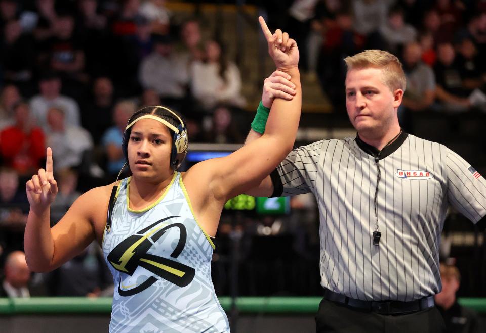 Westlake’s Keilikki Nau Rarick is declared the winner of a wrestling match against Murray’s Cheyenne Ruiz during the Ross Brunson Utah All-Star Dual at the UCCU Events Center in Orem, on Tuesday, Jan. 9, 2024. | Kristin Murphy, Deseret News