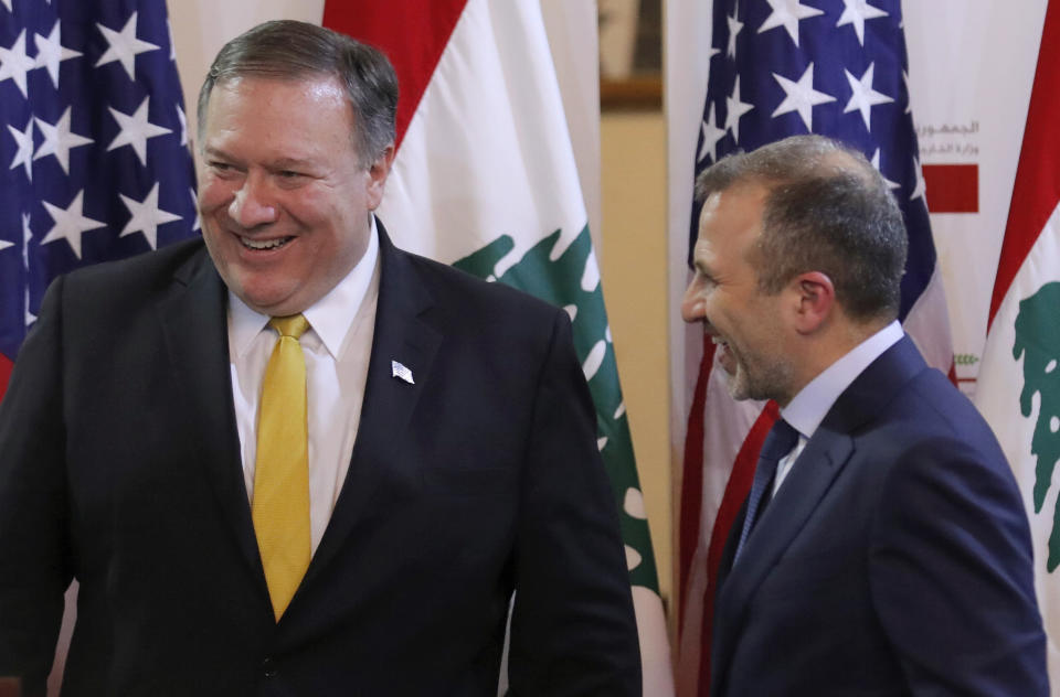 U.S. Secretary of State Mike Pompeo and Lebanese Foreign Minister Gebran Bassil react, in Beirut, Lebanon March 22, 2019, after a public statement in Beirut, Lebanon, Friday, March 22, 2019. (Jim Young/Pool Image via AP)