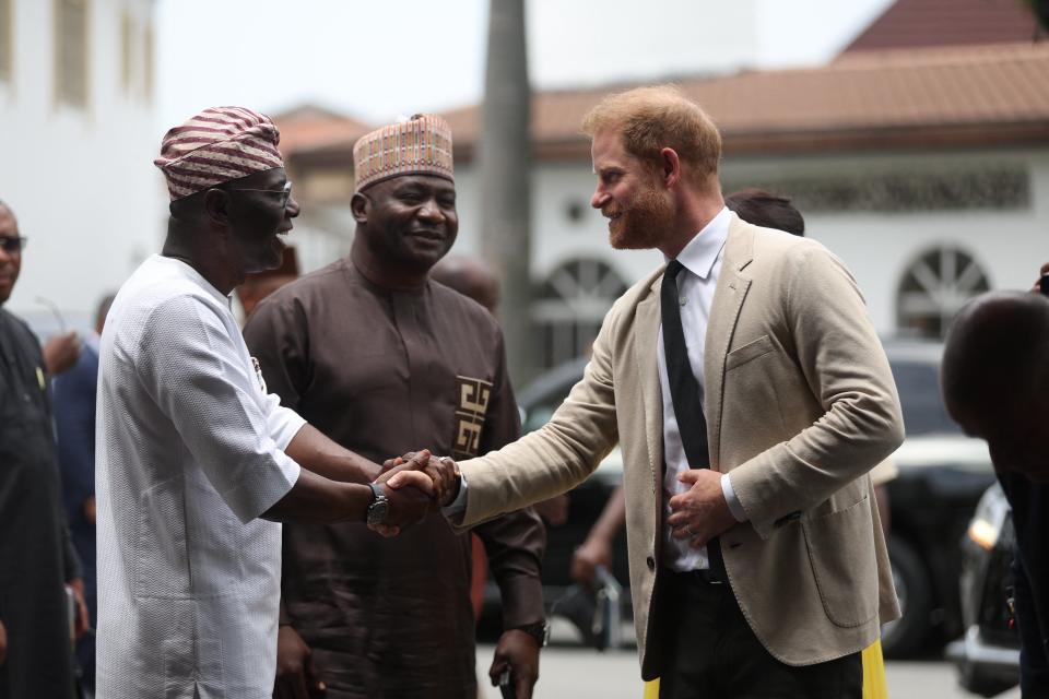 Babajide Sanwo-Olu with Harry and Meghan (AFP via Getty Images)