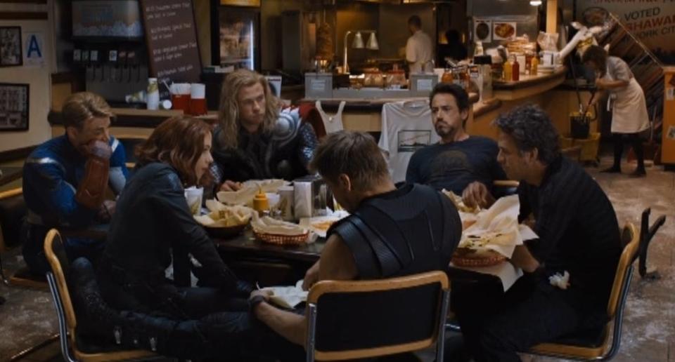 avengers sitting around a table eating tacos