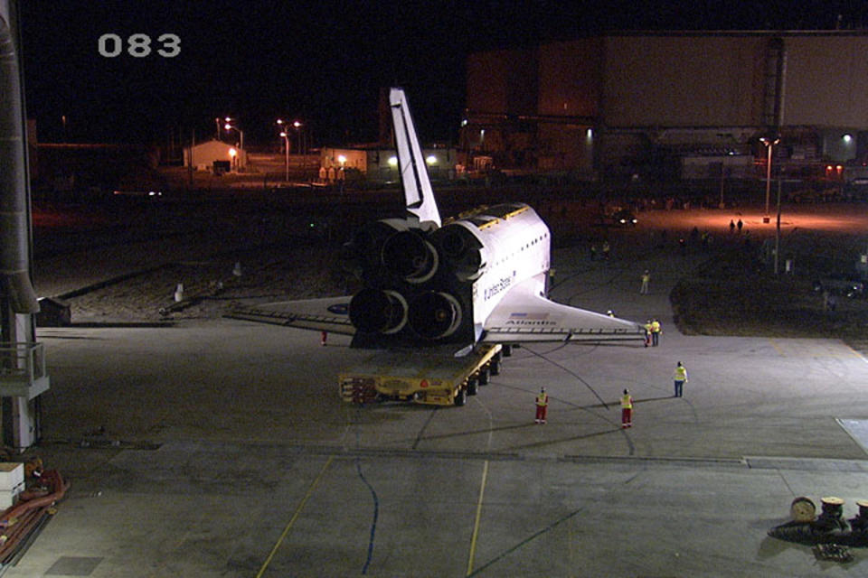 This image from video provided by NASA-TV shows the Space shuttle Atlantis departing the Vehicle Assembly Building at NASA's Kennedy Space Center in Florida for the last time early Friday Nov. 2, 2012. The spacecraft is moving to the Kennedy Space Center Visitor Complex, where it will be featured in a new display slated to open in July 2013. (AP Photo/NASA-TV)