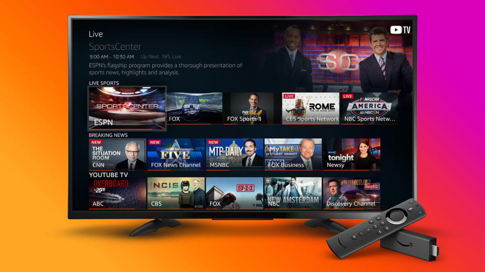 Amazon&#39;s Fire TV Stick in front of a 4K TV showing a menu of apps