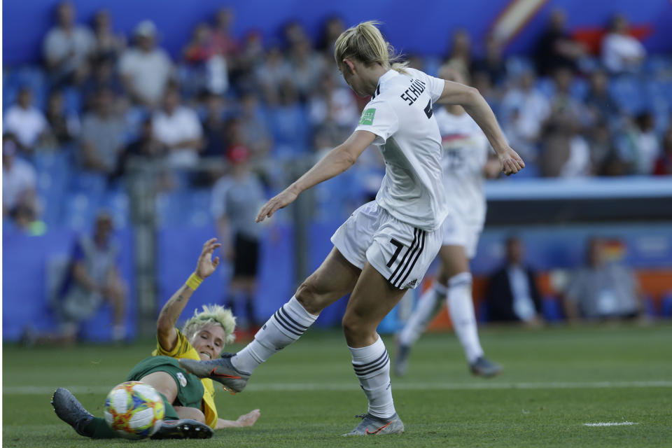 Germany's Lea Schueller, right, attempts a shot at goal in front of South Africa's Janine Van Wyk during the Women's World Cup Group B soccer match between South Africa and Germany at the Stade de la Mosson in Montpellier, France, Monday, June 17, 2019. (AP Photo/Claude Paris)