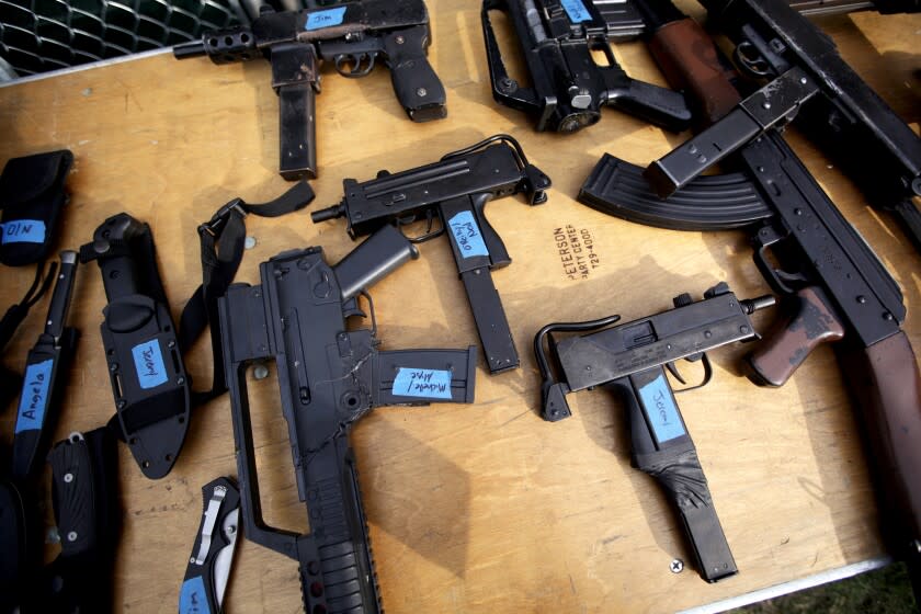 BOSTON - JULY 20: Gun props for the production of "Coriolanus" lie on a table backstage during rehearsal for the Commonwealth Shakespeare production of the play on Boston Common. "Coriolanus," Shakespeare's most political play, echoes current events in the United States and abroad. (Photo by Tamir Kalifa for The Boston Globe via Getty Images)