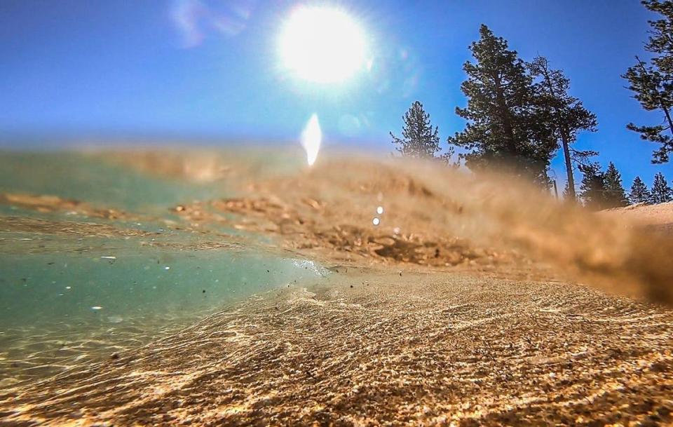 Water laps at the shore at Lake Tahoe’s Pope Beach in July. A dry cleaning company may have polluted some of California’s purest water by discharging perchloroethylene, also known as PCE, the widely used but hazardous dry cleaning solvent.