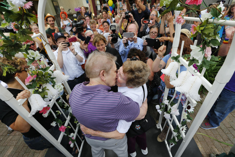 FILE - Ann Sorrell, 78, left, and Marge Eide, 77, of Ann Arbor, a couple for 43 years, embrace after exchanging vows in Ann Arbor, Mich., following a ruling by the US Supreme Court that struck down bans on same sex marriage nation wide on June 26, 2015. The 2020 census was the first census since the U.S. Supreme Court legalized same-sex marriage in 2015. (AP Photo/Paul Sancya, File)